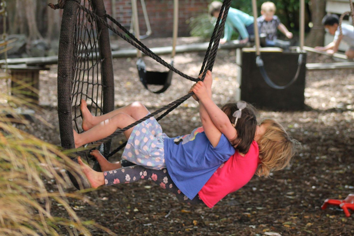 Two children on swing