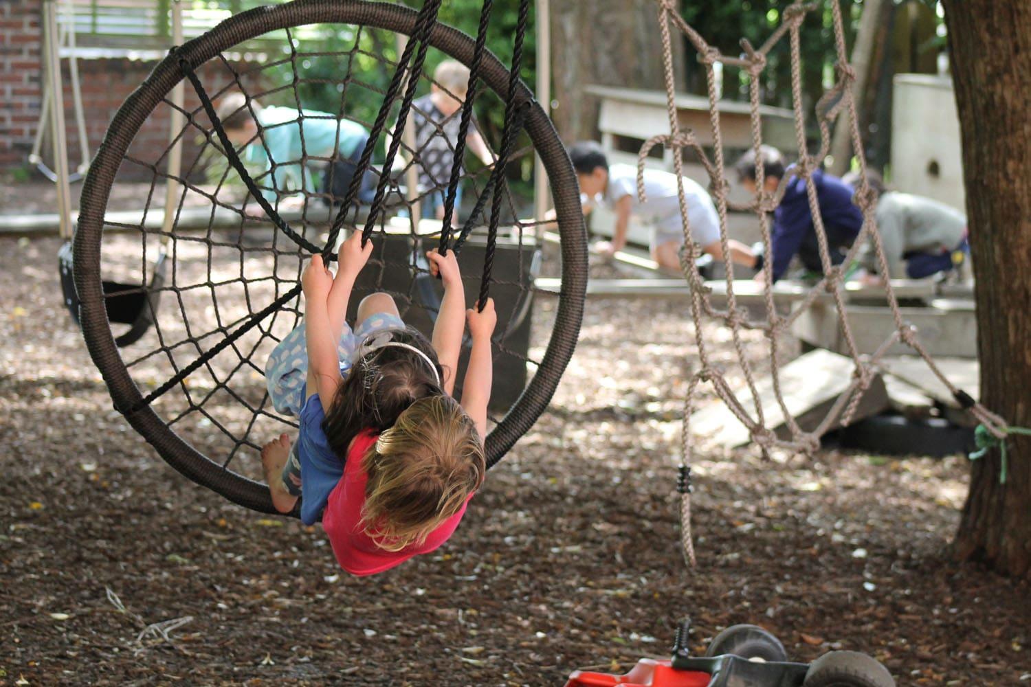 Two children on swing